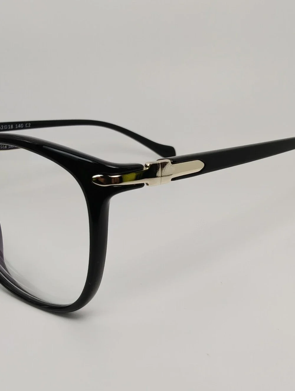 Nola. Classic Black Women's Eyeglass Frames. Gold Shield At Temple Corners.